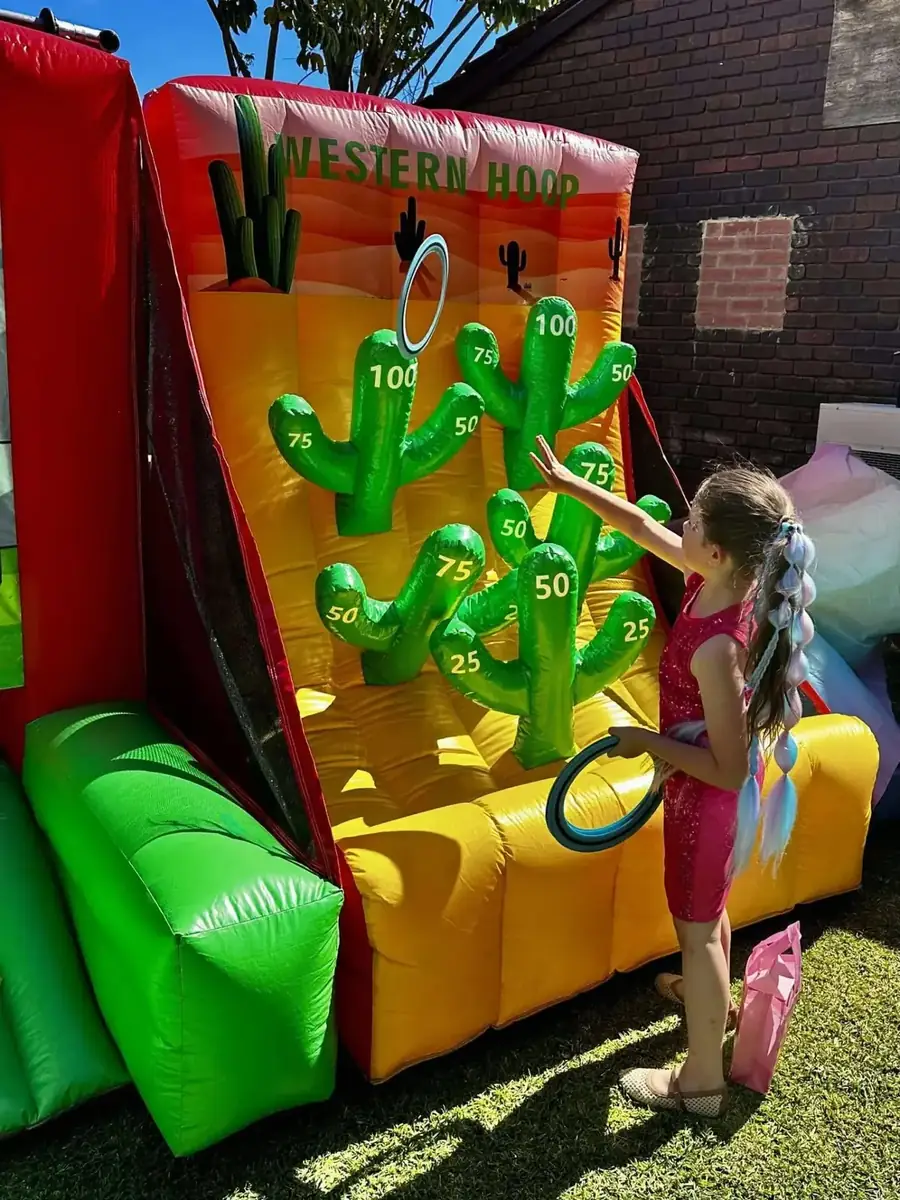 Kids having fun with the Western Hoop ring toss game — Perth, WA