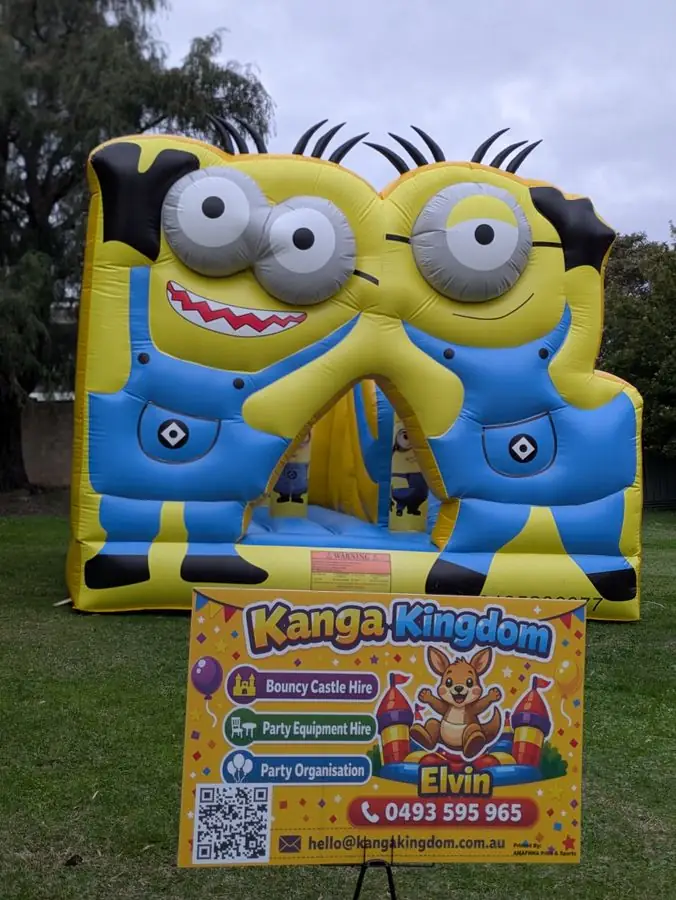 Minions combo castle set up and ready, with the Kanga Kingdom sign out front — Perth, WA